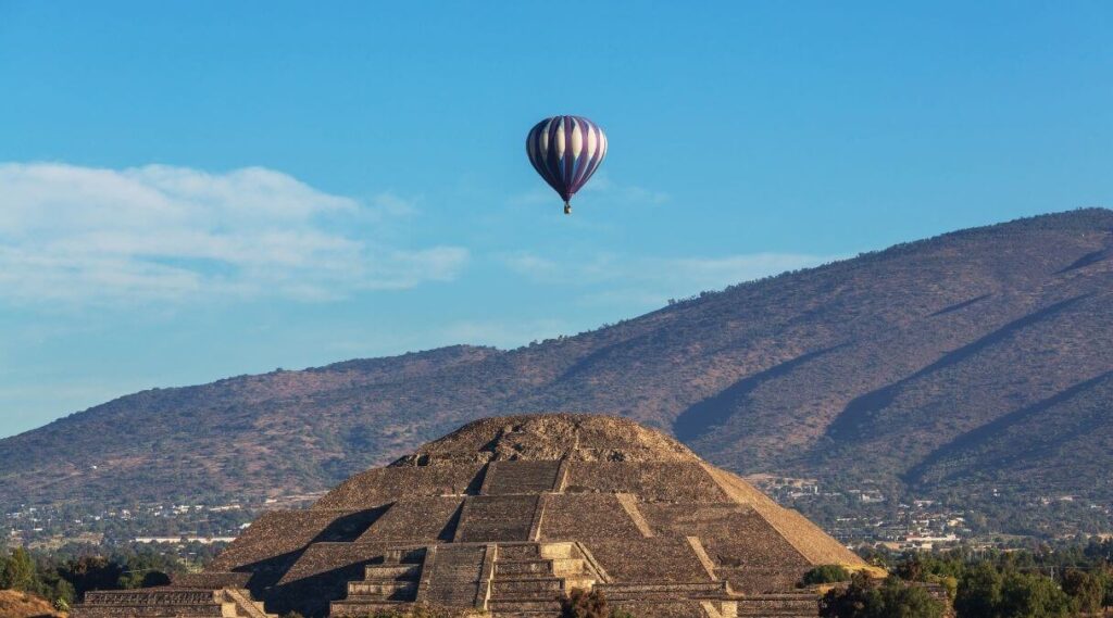 Hot air balloon flight over the Teotihuacan pyramids at sunrise, Mexico City.