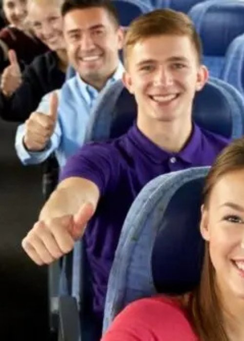 Tourists smiling on a private transport